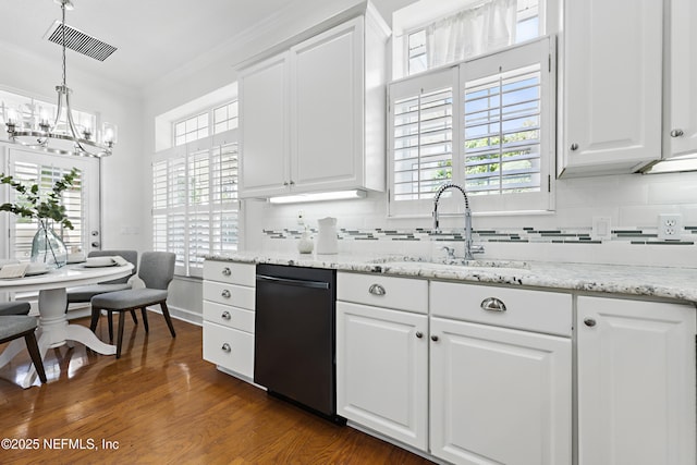 kitchen featuring dark wood-style floors, visible vents, a sink, black dishwasher, and crown molding