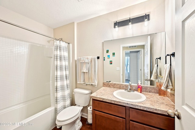 bathroom featuring shower / bath combo, visible vents, toilet, a textured ceiling, and vanity