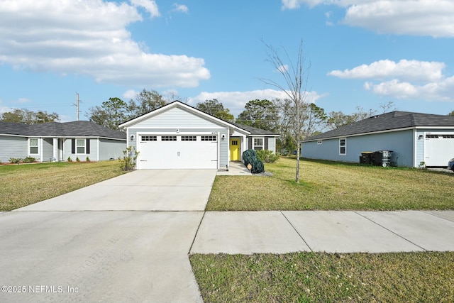 ranch-style house with driveway, an attached garage, and a front lawn