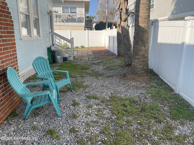 view of yard featuring a fenced backyard