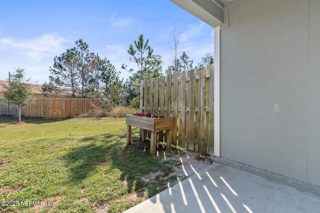 view of yard featuring fence