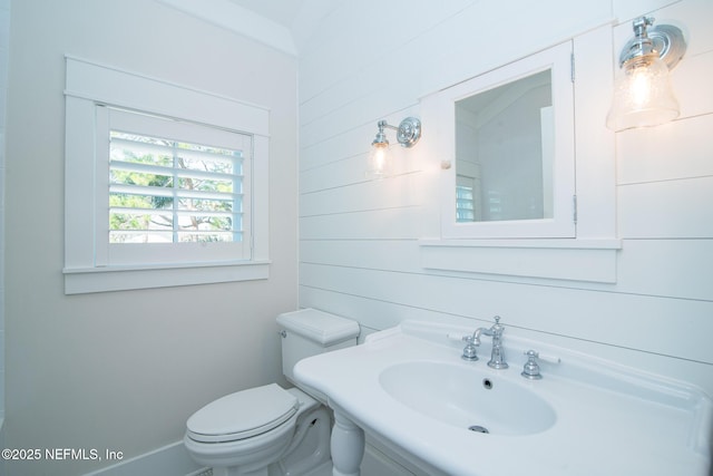 bathroom featuring a sink and toilet