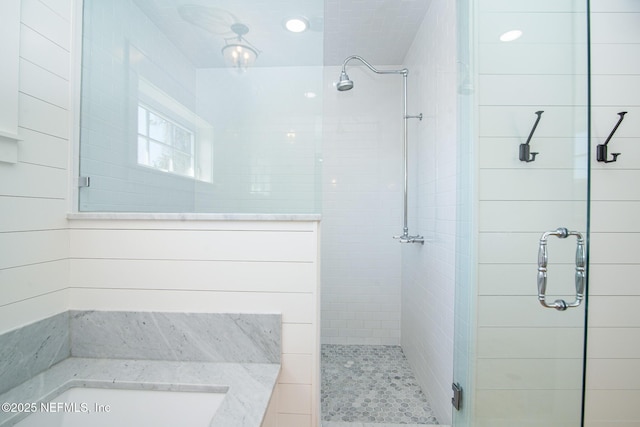 bathroom featuring a stall shower