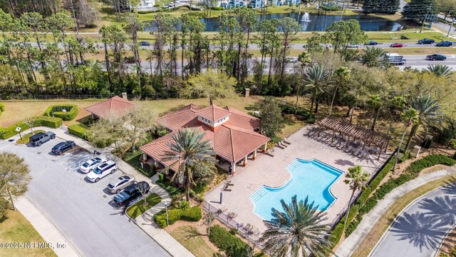 birds eye view of property featuring a water view