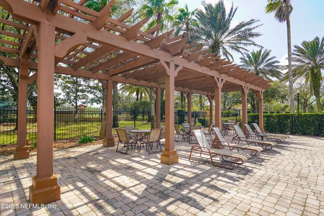 view of patio with fence and a pergola