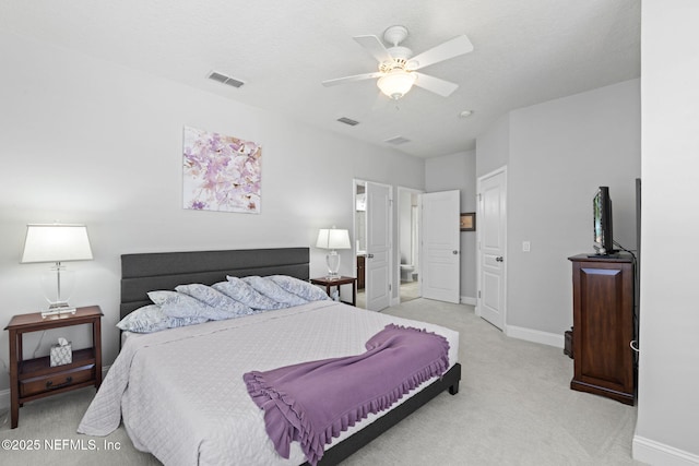 bedroom with visible vents, light carpet, baseboards, and ceiling fan