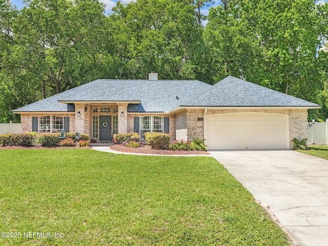 single story home with brick siding, a shingled roof, fence, driveway, and a front yard