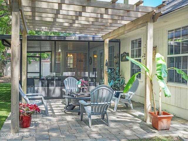 view of patio featuring a pergola