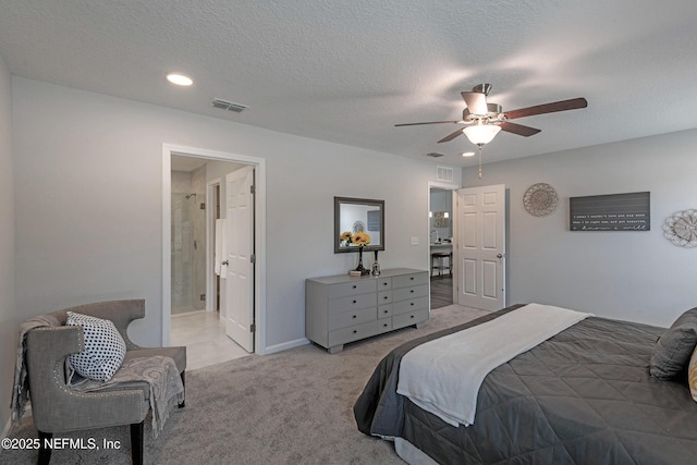 bedroom with light carpet, a textured ceiling, visible vents, and a ceiling fan