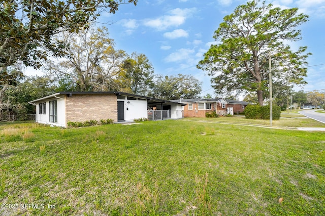 view of yard with fence