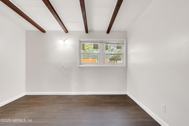 unfurnished room featuring wood finished floors, beam ceiling, and baseboards