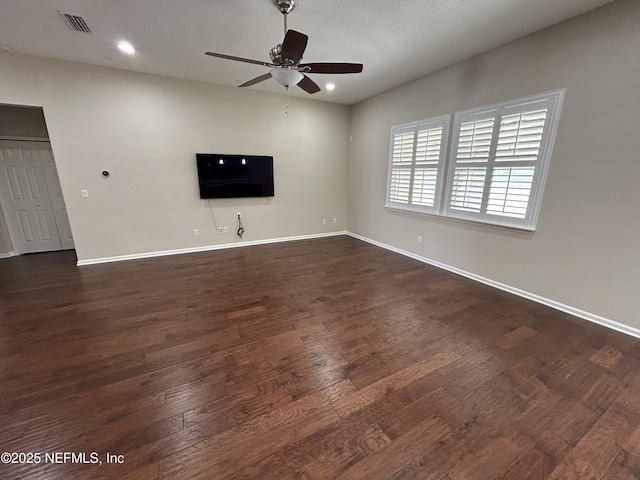 unfurnished living room with visible vents, dark wood-style floors, recessed lighting, baseboards, and ceiling fan