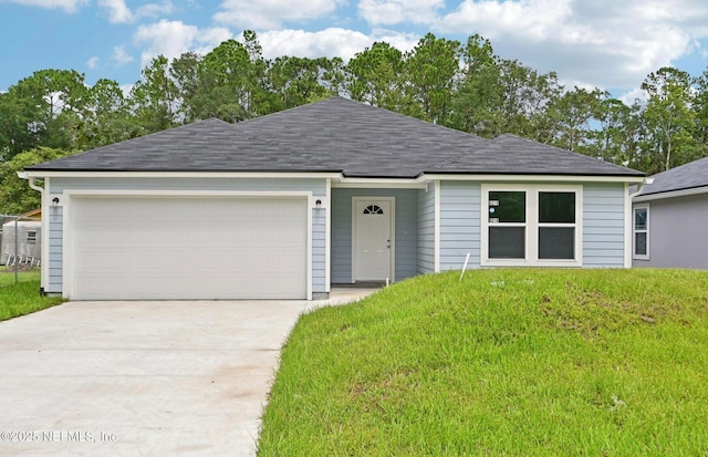 single story home featuring a garage, a front lawn, driveway, and a shingled roof