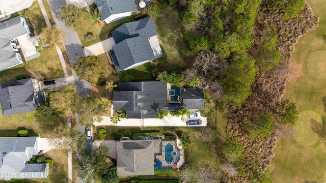 birds eye view of property with a residential view