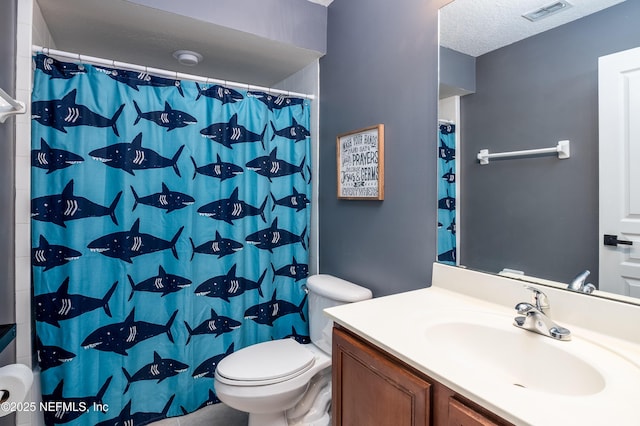 full bathroom featuring curtained shower, visible vents, toilet, a textured ceiling, and vanity