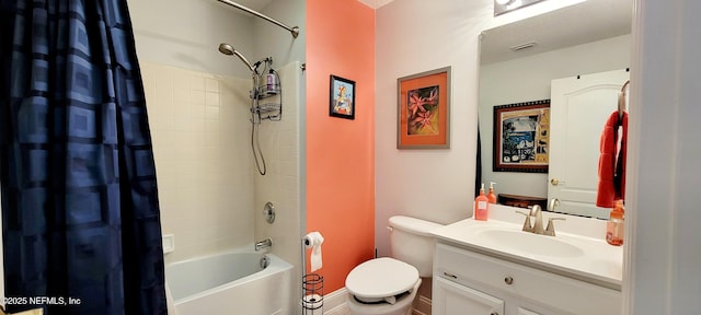 full bathroom featuring visible vents, shower / tub combo, toilet, and vanity