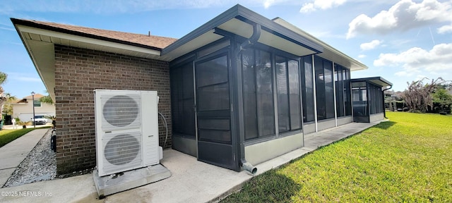 exterior space featuring ac unit and a sunroom