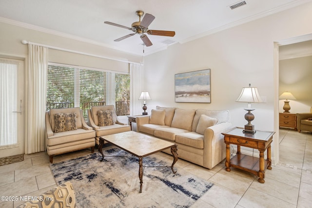 living area featuring ornamental molding, light tile patterned flooring, visible vents, and a ceiling fan