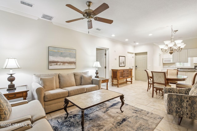 living area with ornamental molding, light tile patterned flooring, visible vents, and recessed lighting