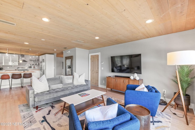 living area with recessed lighting, wood ceiling, visible vents, and light wood finished floors