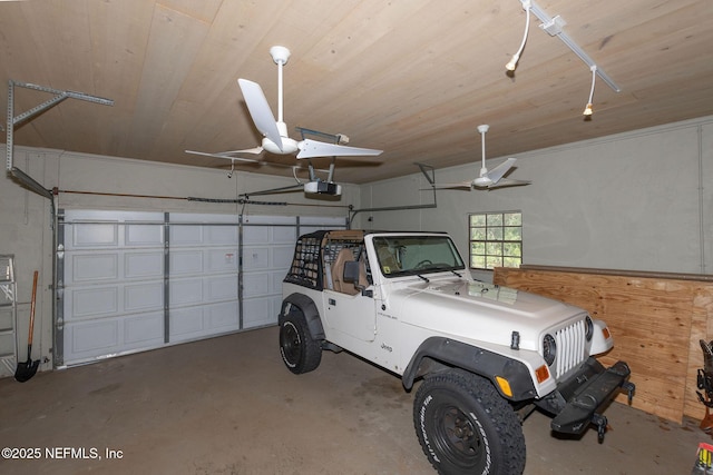 garage with wood ceiling and a garage door opener