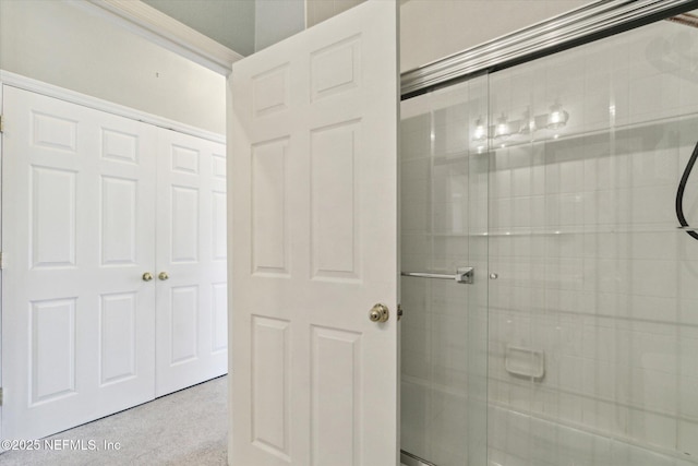 bathroom with a shower stall