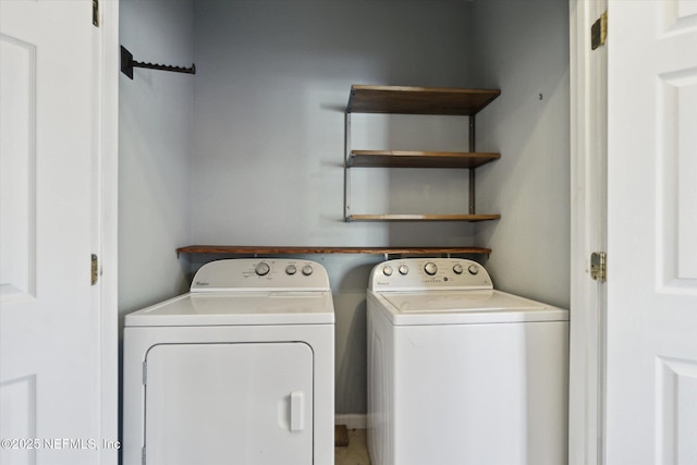 laundry area with laundry area and washer and dryer