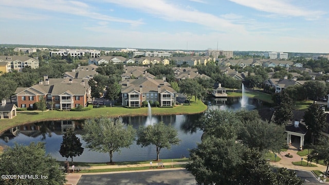 bird's eye view with a water view and a residential view