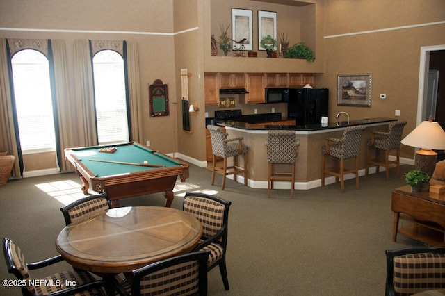 game room featuring light carpet, baseboards, a sink, and pool table