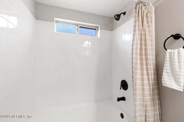 full bathroom with shower / bathtub combination with curtain