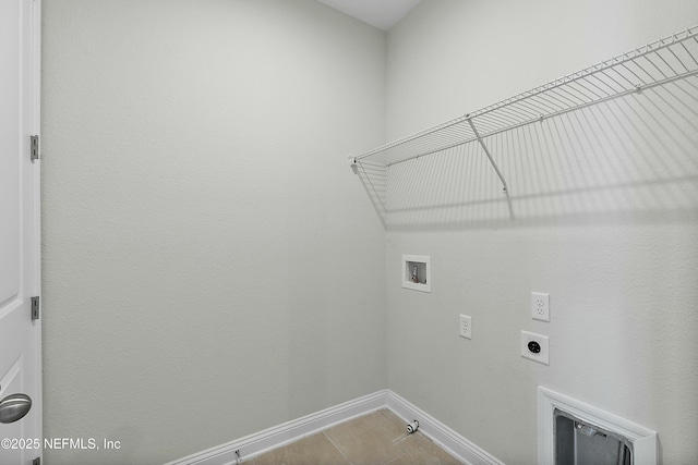 washroom featuring hookup for a washing machine, baseboards, laundry area, electric dryer hookup, and hookup for a gas dryer