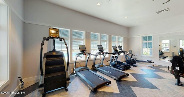 workout area with recessed lighting, visible vents, baseboards, and tile patterned floors