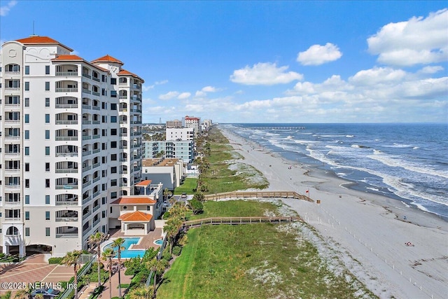 exterior space with a city view and a beach view