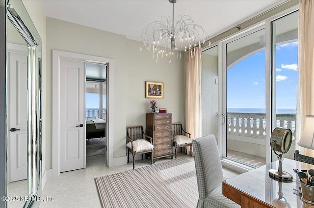 office featuring a water view, baseboards, and an inviting chandelier