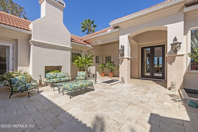 236 Deer Haven Dr, Ponte Vedra Beach, FL 32082 - view of patio / terrace with french doors and an outdoor living space