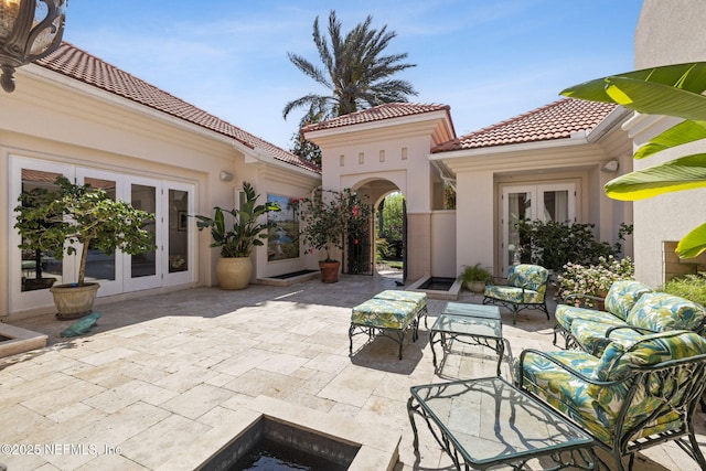 236 Deer Haven Dr, Ponte Vedra Beach, FL 32082 - view of patio / terrace featuring french doors and an outdoor living space