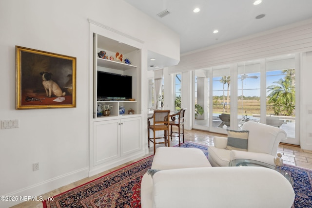 236 Deer Haven Dr, Ponte Vedra Beach, FL 32082 - living area featuring healthy amount of natural light, recessed lighting, baseboards, and built in shelves