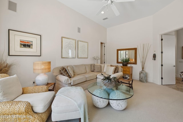 236 Deer Haven Dr, Ponte Vedra Beach, FL 32082 - living room featuring ceiling fan, carpet flooring, baseboards, and a towering ceiling