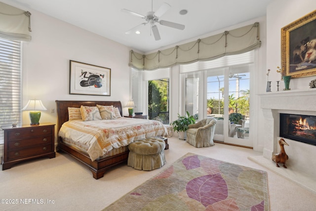 236 Deer Haven Dr, Ponte Vedra Beach, FL 32082 - bedroom featuring light carpet, access to exterior, a high end fireplace, recessed lighting, and ceiling fan