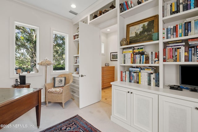 236 Deer Haven Dr, Ponte Vedra Beach, FL 32082 - living area with a desk, ornamental molding, light colored carpet, and built in shelves