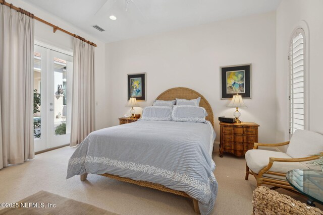 236 Deer Haven Dr, Ponte Vedra Beach, FL 32082 - carpeted bedroom with access to exterior, multiple windows, and recessed lighting