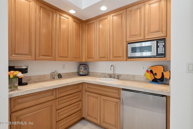 236 Deer Haven Dr, Ponte Vedra Beach, FL 32082 - kitchen featuring stainless steel microwave, refrigerator, a sink, light countertops, and recessed lighting
