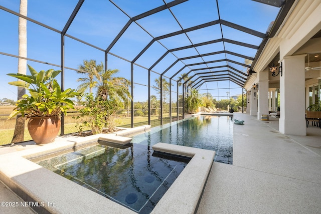 236 Deer Haven Dr, Ponte Vedra Beach, FL 32082 - view of pool featuring a pool with connected hot tub, a patio area, and glass enclosure