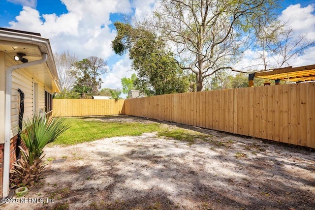 view of yard featuring a fenced backyard