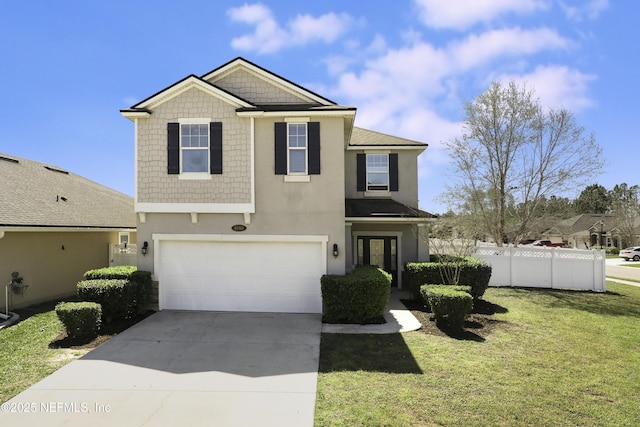 view of front of home featuring fence, driveway, an attached garage, stucco siding, and a front lawn
