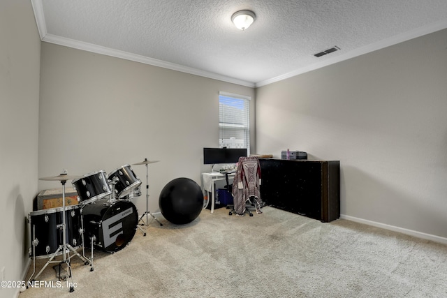 carpeted office with visible vents, baseboards, a textured ceiling, and crown molding