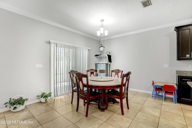 dining area featuring light tile patterned flooring, baseboards, visible vents, and ornamental molding