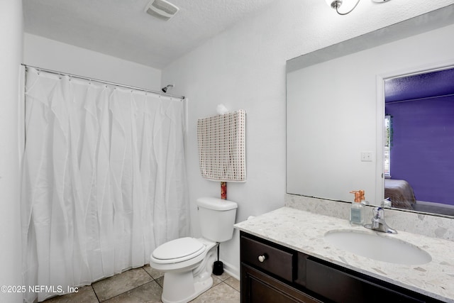 full bath featuring visible vents, toilet, ensuite bathroom, tile patterned flooring, and vanity