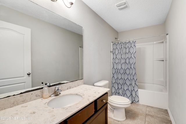 full bath with vanity, shower / bath combo with shower curtain, a textured ceiling, tile patterned floors, and toilet