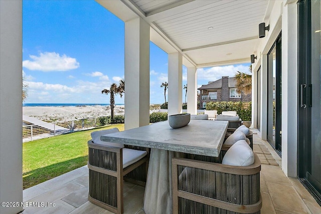 view of patio featuring a water view